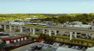 Aerial video of the DART rail at the Downtown Carrollton station in Carrollton, TX